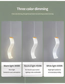 Modern gold acrylic LED ceiling light.