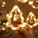 Curtain of bright Christmas lights with 10 miniature Christmas figures.