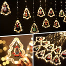 Curtain of bright Christmas lights with 10 miniature Christmas figures.
