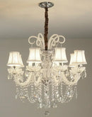 Illuminate your home with the Crystal Candle Chandelier – Luxury Modern Hanging Light for Large Living Rooms, a premium crystal pendant designed to bring elegance, brilliance, and high-end illumination to spacious interiors. Crafted from durable iron and premium crystal, this modern luxury chandelier features a multilayer crystal structure that beautifully refracts LED light, creating a dazzling and sophisticated glow ideal for large living rooms, dining areas, foyers, stair halls, and upscale décor. With 1