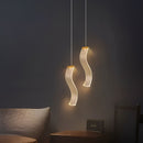 Modern gold acrylic LED ceiling light.