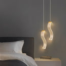 Modern gold acrylic LED ceiling light.