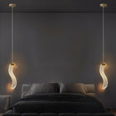 Modern gold acrylic LED ceiling light.