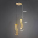 Modern gold acrylic LED ceiling light.